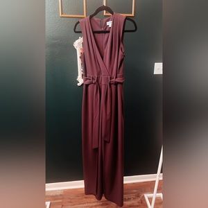 Purple jumpsuit with leg slits